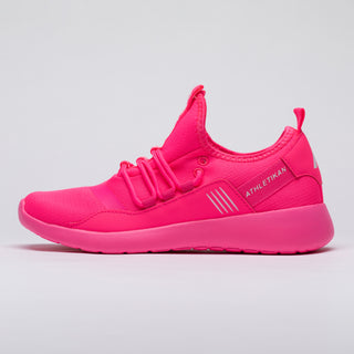 hot pink sneakers feature shot on white background