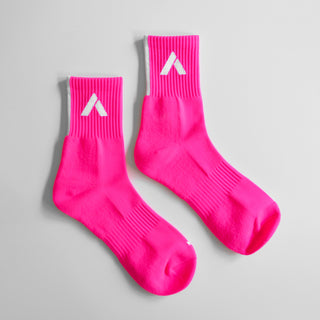 hot pink socks product photo on white background