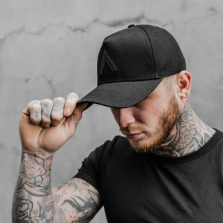 plain black cap with super high quality stitching on ginger man